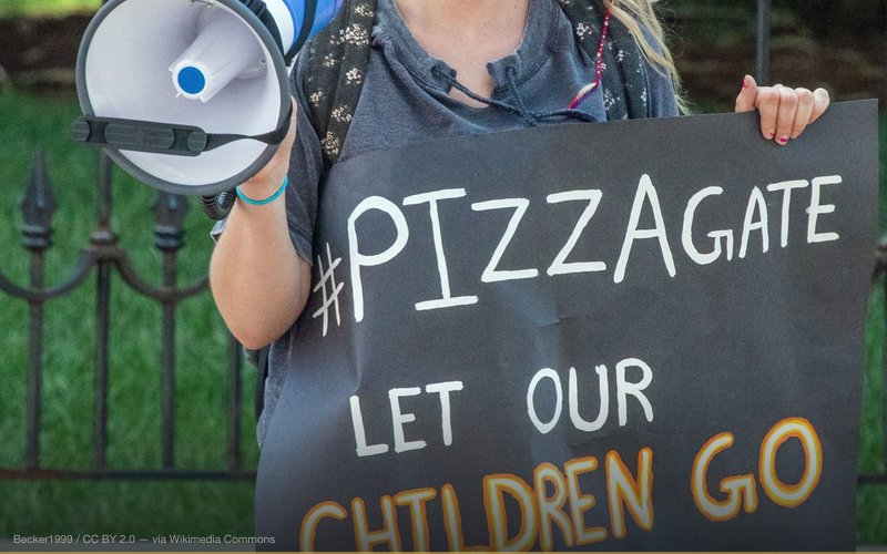 Pizzagate protester — related to Adrenochrome Harvesting Conspiracy Theory